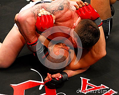 Mike Stewart lands a punch to the head. Editorial Stock Photo