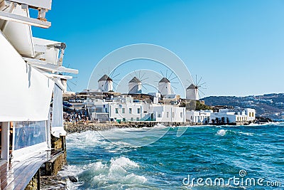 Mykonos windmills in Chora, the Old Town, iconic feature of the island. Editorial Stock Photo