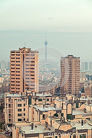 Milad Tower Between Two Skyscrapers in the Skyline of Tehran Stock Photo