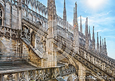 Milan Cathedral roof, Italy, Europe. Milan Cathedral or Duomo di Milano is top landmark of Milan city. Beautiful Gothic Stock Photo