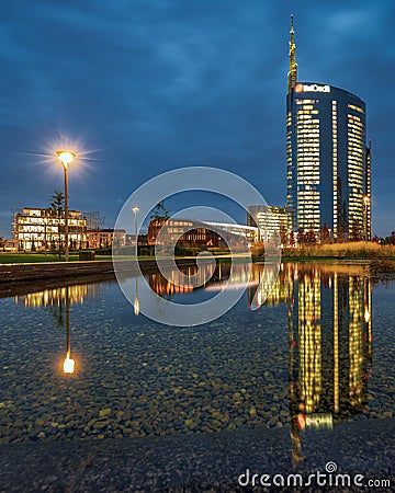 Milan cityscape in the mirror at the blue hour Stock Photo