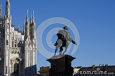 Milan a glimpse of the beautiful cathedral city with a statue in Stock Photo