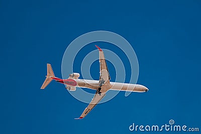 Milan, Italy 6.12.2023 Airplane in the sky, Passenger Airliner. Airplane flying on blue sky. Editorial Stock Photo