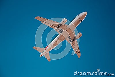 Milan, Italy 6.12.2023 Airplane in the sky, Passenger Airliner. Airplane flying on blue sky. Editorial Stock Photo
