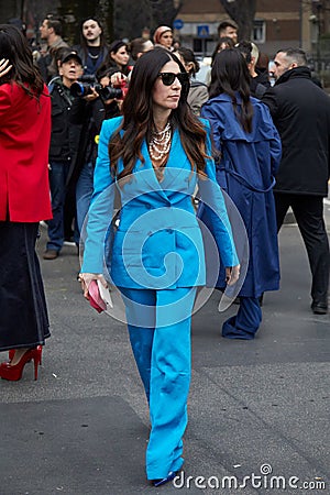 MILAN, ITALY - FEBRUARY 22, 2023: Alessandra Airo with blue jacket and trousers before Alberta Ferretti fashion show, Milan Editorial Stock Photo