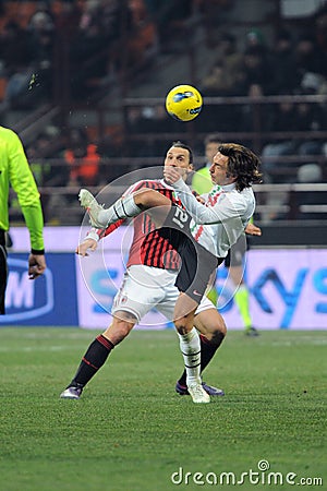 Andrea Pirlo and Slatan Ibrahimovic in action during the match Editorial Stock Photo