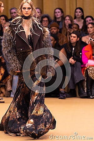 A model walks the runway at the Roberto Cavalli fashion show during the Milan Fashion Week Editorial Stock Photo