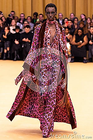 A model walks the runway at the Roberto Cavalli fashion show during the Milan Fashion Week Editorial Stock Photo