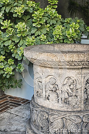 Milan Italy: historiated vase in via Francesco Ferrucci Stock Photo