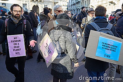 People with pink colored hands demonstrate against fashion and pollution before Salvatore Editorial Stock Photo