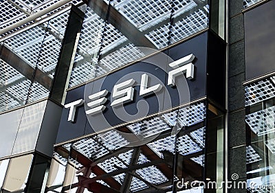 MILAN, ITALY - JULY 19, 2017: Tesla Motors store in Piazza Gae Aulenti square in Milan, Italy Editorial Stock Photo