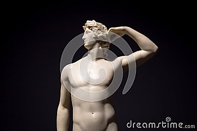 Apollo Crowning Himself - Antonio Canova`s ancient sculpture in Italian Museum Editorial Stock Photo