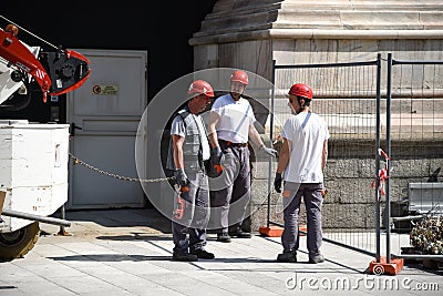 Workers on walls of Duomo di Milan Editorial Stock Photo