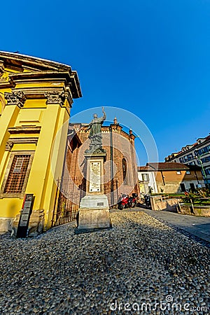 Milan, Italy - October 19th, 2015:sculpture Karolo priest who holds the holy cross Editorial Stock Photo