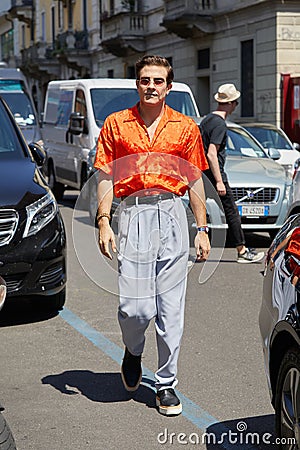 Carlo Sestini with orange shirt before Sartorial Monk fashion show, Milan Fashion Week street style on June 18, Editorial Stock Photo