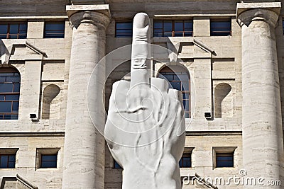 Sculpture of Cattelan`s finger in front of the Milan Stock Excha Editorial Stock Photo