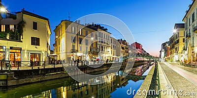 Milan Navigli Milano restaurant and bar district travel traveling holidays vacation town blue hour panorama in Italy Stock Photo