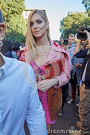 Chiara Ferragni with pink clothing before Prada fashion show, Milan Fashion Week street style on September Editorial Stock Photo