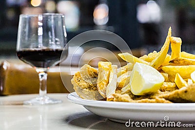 Milanesas con papas fritas & x28;schnitzel made with cow beef and fri Stock Photo