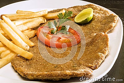 Milanese with fries Stock Photo