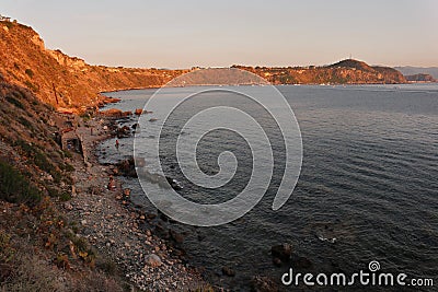 Milazzo - Panorama costiero da Capo Milazzo al tramonto Stock Photo