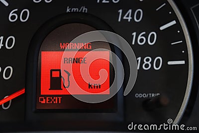 Mile digital screen console , fuel oil , warning about empty petrol Stock Photo