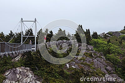 Mile High Bridge spans a chasm atop Grandfather Mountain in Western North Carolina. Stock Photo