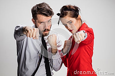 The militant business man and woman Stock Photo