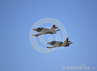 Military aircraft aerobatic flight pair Editorial Stock Photo