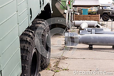 Military base with weapons and heavy machinery. Army naval post with air boms outdoors. Cold war and militarizatio Stock Photo