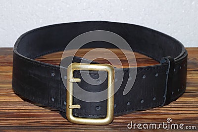 Military belt soldier men`s leather on the table Stock Photo