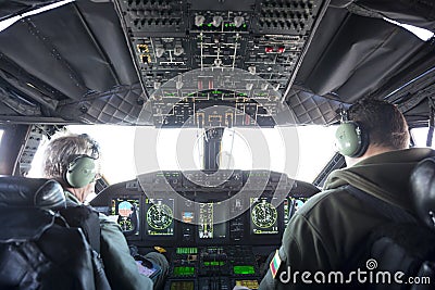 Military carrier airplane cockpit and pilots Editorial Stock Photo