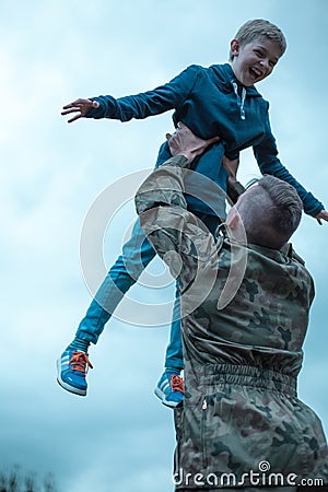 Military father returning home Stock Photo