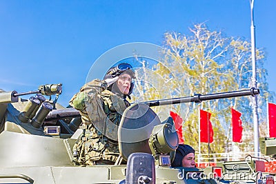 Military greeting by the commander of the crew of armored vehicles at a parade rehearsal on a city street Editorial Stock Photo