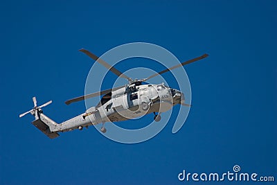 Military helicopter hovering Stock Photo