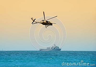 Military helicopter on patrol Stock Photo