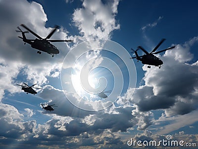 Military Helicopters Flying in Formation Stock Photo