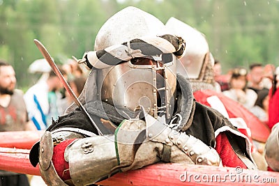 Military and historical festival. Reconstruction. Knight Editorial Stock Photo