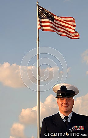 Military man and flag Stock Photo