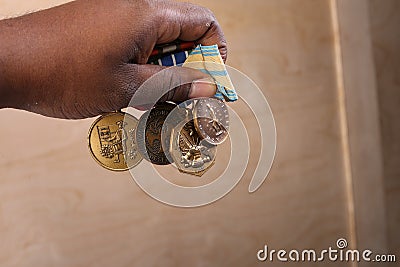 Military Medals in a hand Stock Photo