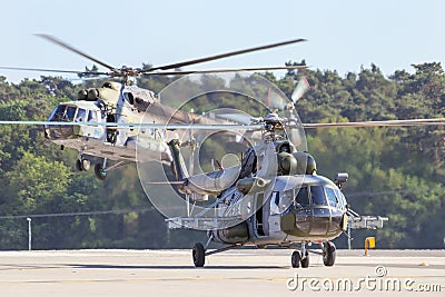 Military Mi-17 helicopters landing Editorial Stock Photo