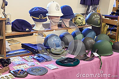 Military, naval, and police headwear on display Editorial Stock Photo
