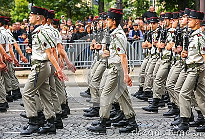 Military parade (Defile) during the ceremonial of french national day, Champs Elysee avenue. Editorial Stock Photo