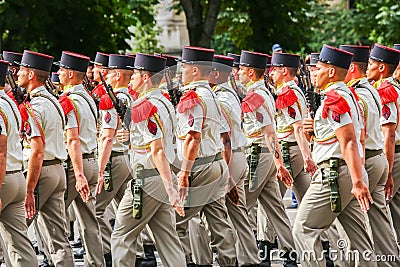 Military parade (Defile) during the ceremonial of french national day, Champs Elysee avenue. Editorial Stock Photo