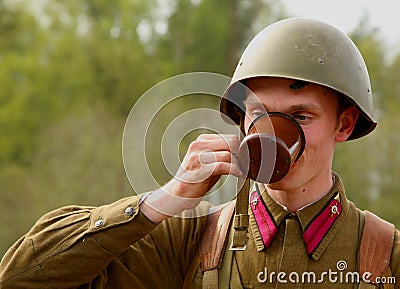 Military re - enactor in Russian soviet uniform world war II. Russian soldier. Editorial Stock Photo