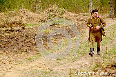 Military re - enactor in Russian soviet uniform world war II. Russian soldier. Editorial Stock Photo