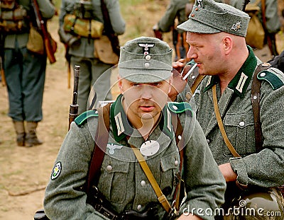 Military re - enactors in German uniform world war II. German soldiers. Editorial Stock Photo