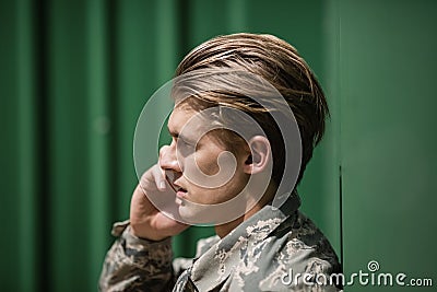 Military soldier talking on mobile phone Stock Photo