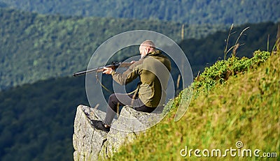 Military style. male in camouflage. muscular man hold weapon. purpose and success. army forces. sniper reach target Stock Photo