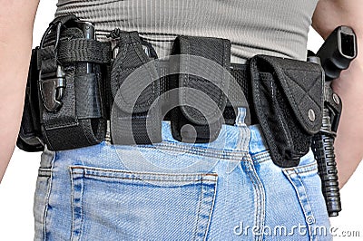 Military tactical belt with semi-automatic buckle for connection with cartridge pouch, placed on man`s belt, isolated - back view Stock Photo